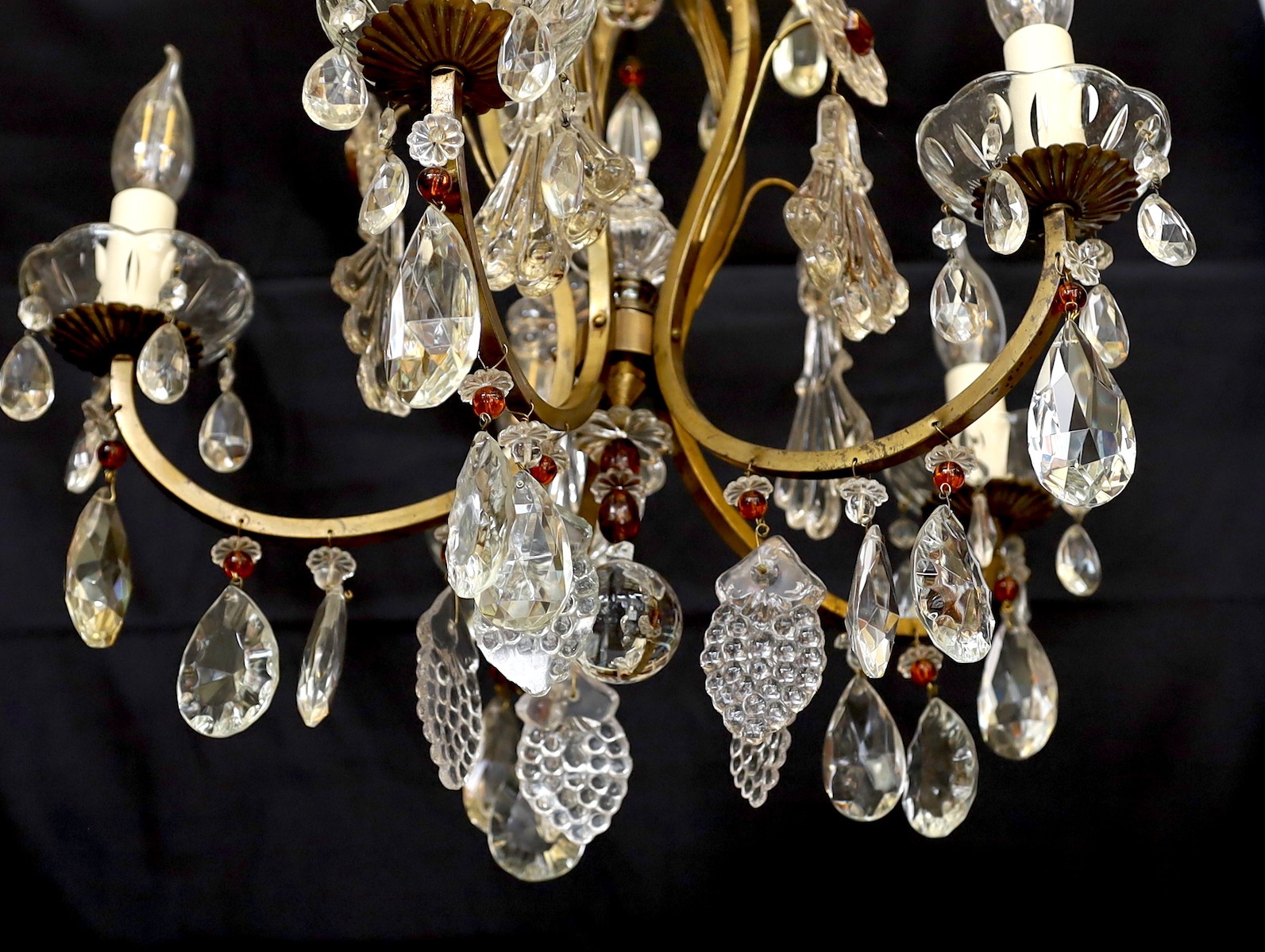 An early 20th century French bronzed metal and glass drop five light chandelier, height 63cm. width 48cm